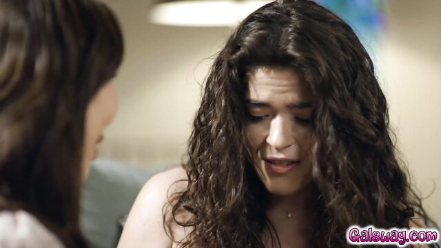 Victoria Voxxx and Nicole Doshi lesbian thumbnail, curly brunette faces closeup