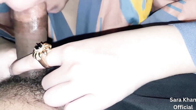 Sara Khan sucking cock closeup with gold ring on hand