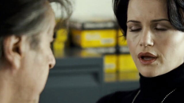 Carla Gugino as Karen Corelli in intense close-up stare, Righteous Kill