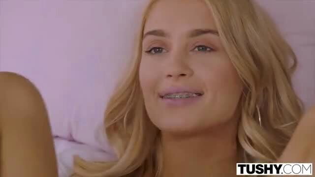 Doll Baby Bell teases with braces smile in Tushy teen anal preview