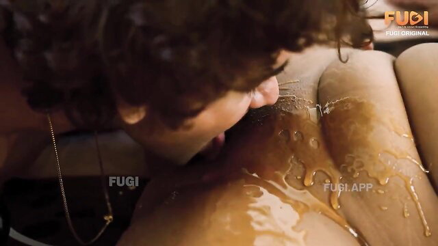 Choco Massage: Curly-haired man licks honey off woman's big tan ass closeup