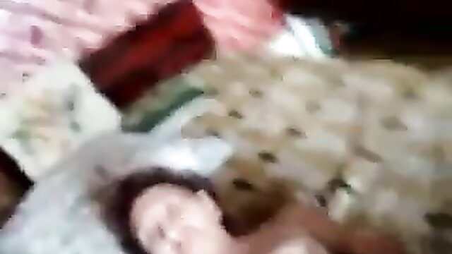 Mature French amateur woman lying nude on bed in homemade porn