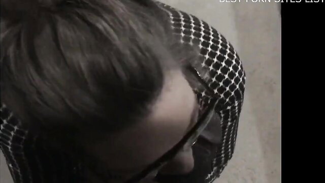 Top-down view of white stepmom in polka-dot top and glasses