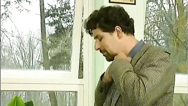 Conny Dachs in Mädcheninternat, curly haired mature man in suit closeup