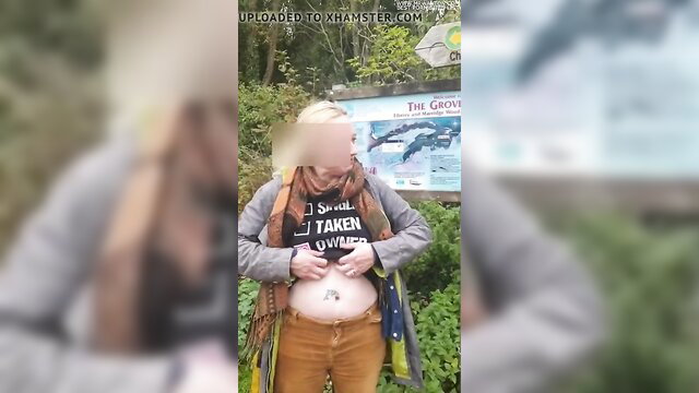Libby slut from Torbay pregnant in 'I AM TAKEN' shirt at aquarium