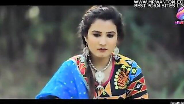 Desi beauty in colorful salwar kameez and dupatta, traditional earrings