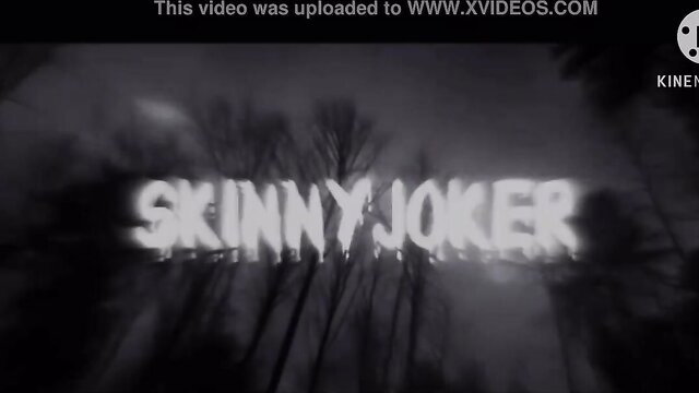 Skinny Joker adult video thumbnail with glowing text and dark trees