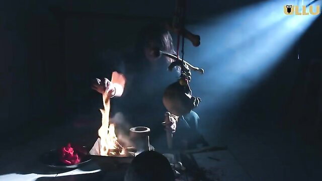 Garam Masala Ullu hot web series woman bound suspended over fire