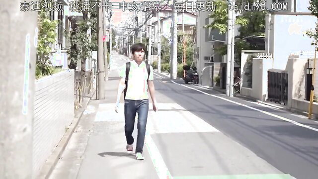 Man walking down the street with a backpack