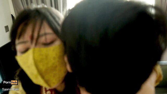 Saanvi Bahl in yellow mask close-up with man, stepmom stepdaughter tease