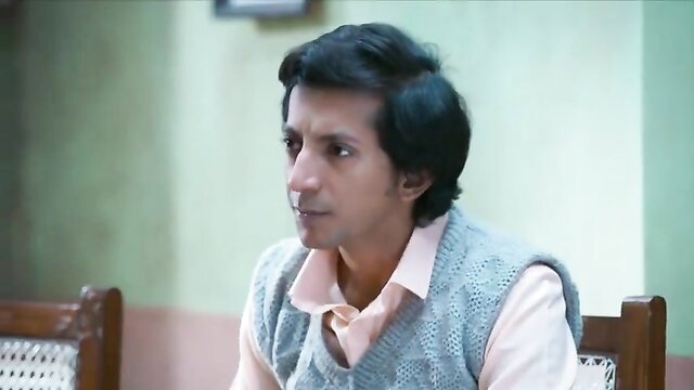 Buddy Hollywood in pink shirt and sweater sits ready for Indian slut Lollypop Gcup