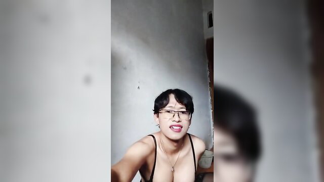 Mitha Zhe Indonesian shemale in lingerie, smiling selfie tease