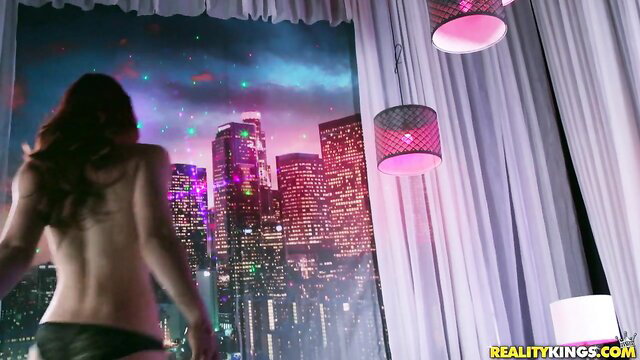 Molly Stewart nude back view dancing by LA skyline window