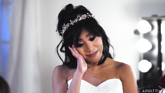 Ember Snow in white wedding dress, emotional closeup, Korra Del Rio nearby