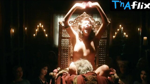 Tamara Feldman topless screaming in ecstasy on throne in Strange Angel