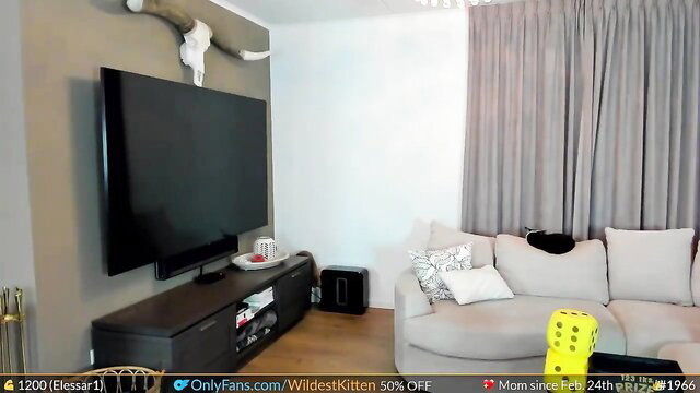 WildestKitten solo on couch in living room, teasing amateur style