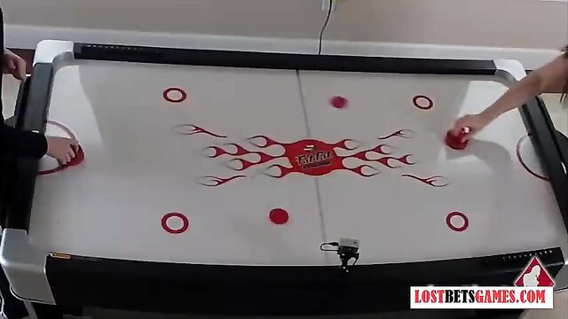 2 hot cuties play strip air hockey, undress game