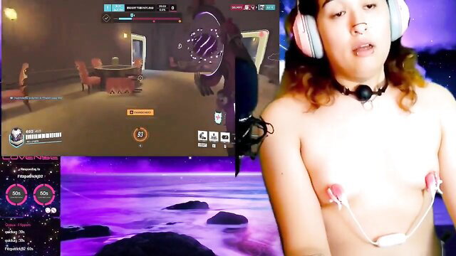 Solumie cute transgirl drooling with ball gag, nipple clamps in Overwatch stream