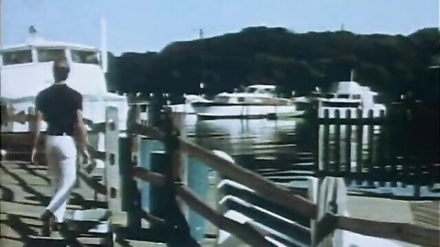 Vintage gay porn: shirtless hunk in tight whites strolls marina dock, Boys in the Sand