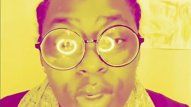 SluttyMelanin in big round glasses, yellow filter Q&A tease