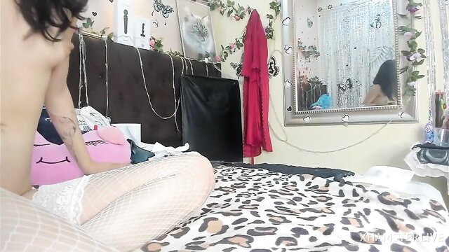 Nude Asian girl in lingerie on leopard bed anal masturbation tease