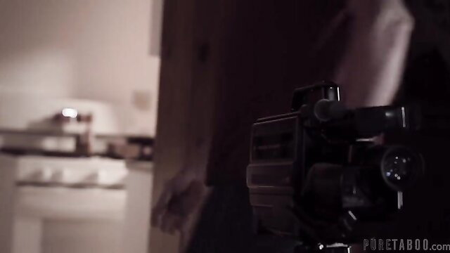 Syren De Mer holds gun in home video with Nikki Sweet