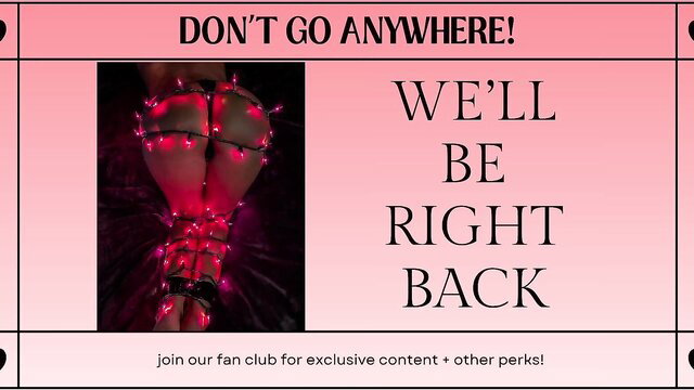 Domanddollxx bound in red Christmas lights BDSM pose