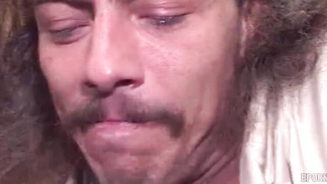 Vintage porn man with mustache closeup intense gaze deep penetration scene