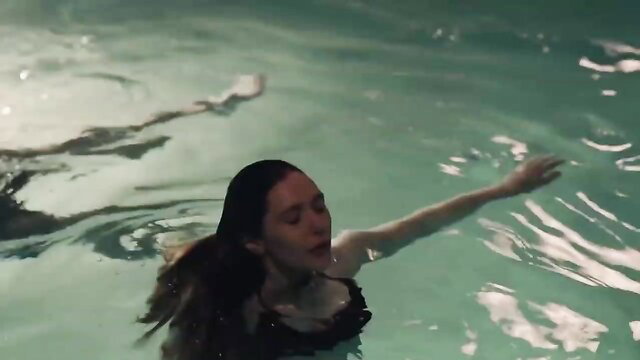 Elizabeth Olsen in water, partially submerged