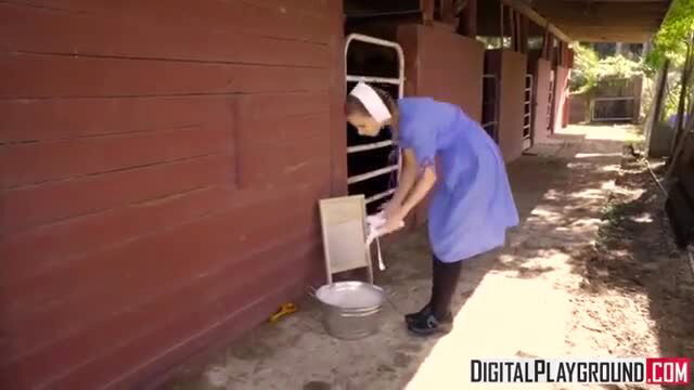 Jillian Janson as Amish nurse in barn, bending over in blue dress