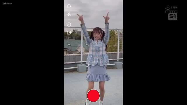 Cute Japanese loli in plaid blazer and pleated skirt poses with peace signs on rooftop