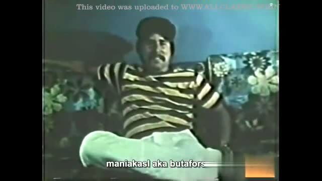 Man in striped shirt and cap lounging on couch in Fantasy Club 02 Luau Girls