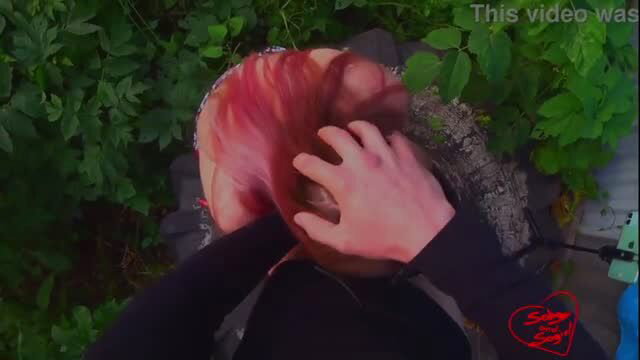 Redhead stepsister sucking stepbrother's dick outdoors