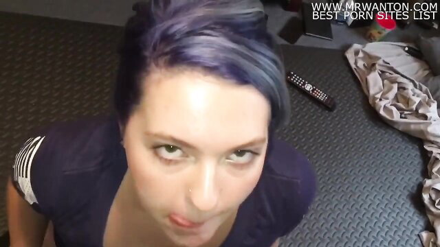 Woman with purple hair looking at camera, possibly AlenaKalashnikov