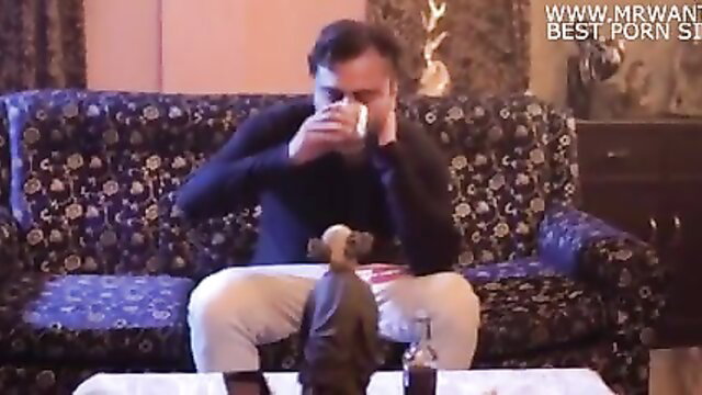 Indian man drinking tea with monkey statue on lap in Holi Pe Chudai Part 2