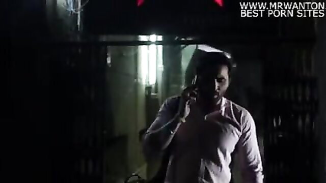 Indian man on phone in dim jail cell, Fach Fach web series porn thumbnail