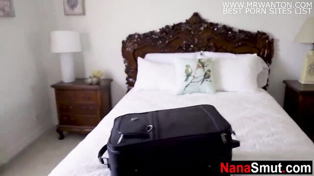 Grandma's friend seduces with suitcase on bed, mature tease