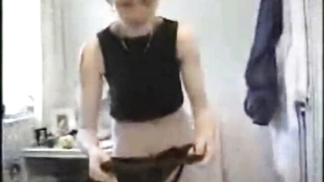 Vivienne pulling down panties, exposing ass in bathroom