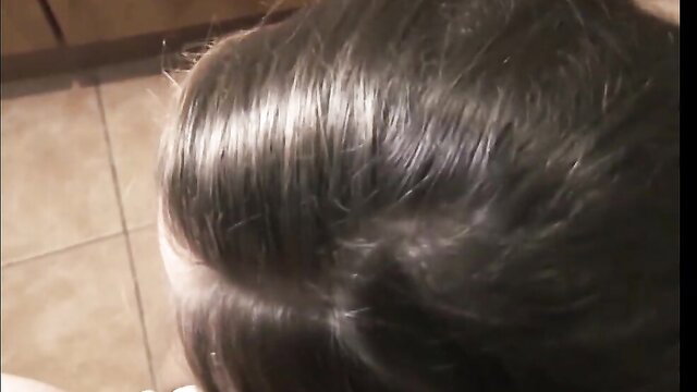 Closeup of sexy mom's glossy black hair from side profile