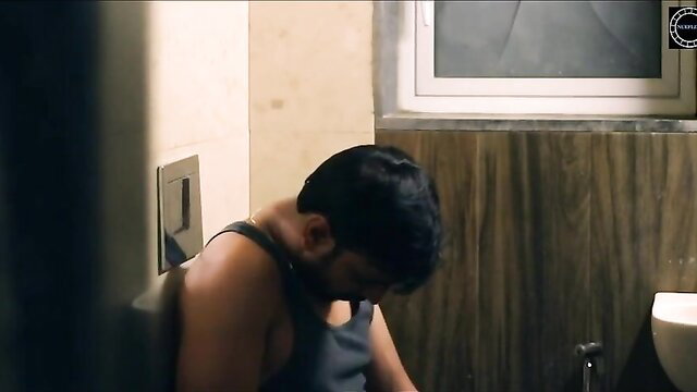 Desi model in tank top squats in bathroom, hot Indian ass tease