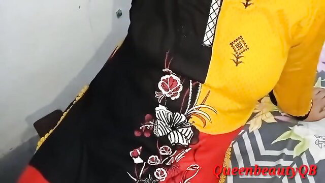Desi Queen Bhabhi in embroidered black-yellow salwar kameez, hot pose