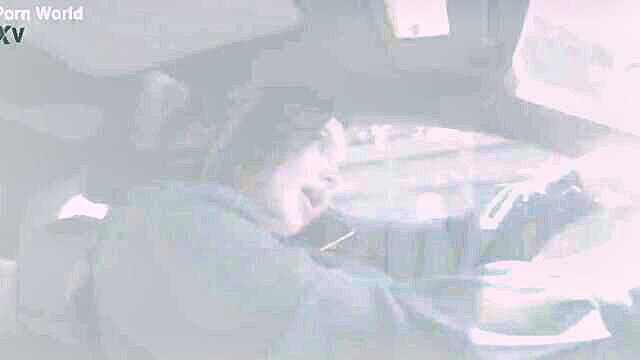 Natasha Nice smiling in car, busty tits spilling out top