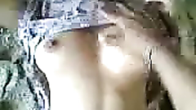 Indian girlfriend topless with foil tape on nipples at construction site