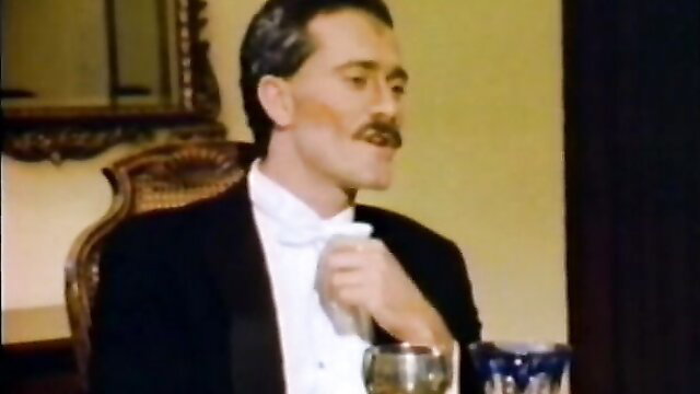 Vintage suited mature man with mustache in elegant pose