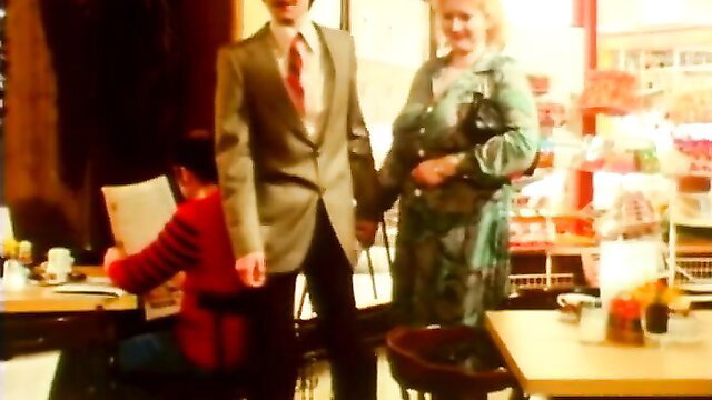 Nasty blonde MILF with short boy in Herzog vintage store scene