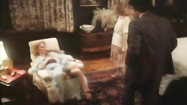 Vintage 1979 blonde in sheer negligee with man, retro softcore tease