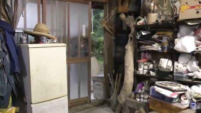 Old Japanese man in cluttered shed with mature woman hat threesome setup