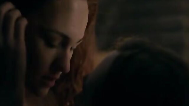 Outlander's Brianna redhead closeup intimate love scene embrace