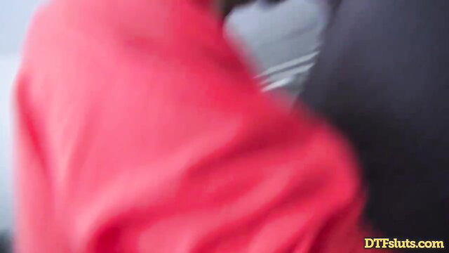 Tana Lea redhead DTF slut in red top and gray skirt closeup
