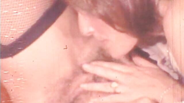 Vintage hardcore maid kissing neck, hand on crotch in O.Z. Films 74